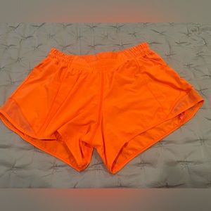 Lululemon Hotty Hot 4” Shorts in Highlight Orange
